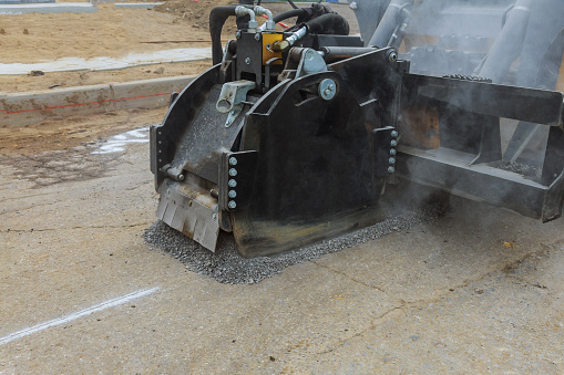 Machine cutting technique remove old asphalt from the road
