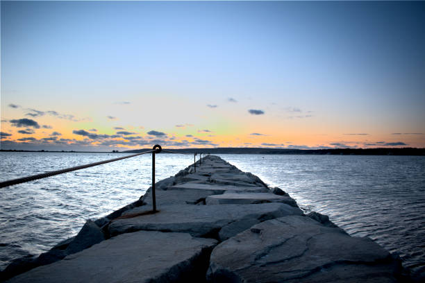 istock Plymouth jetty sunrise 1207775224