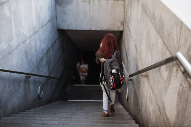 istock Commuter entering a subway station 1207784372