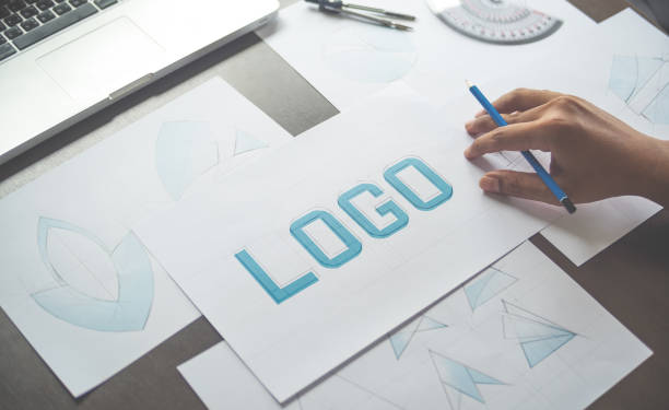 istock Graphic designer creative design sketch drawing logo Trademark brand Workspace 1207784570