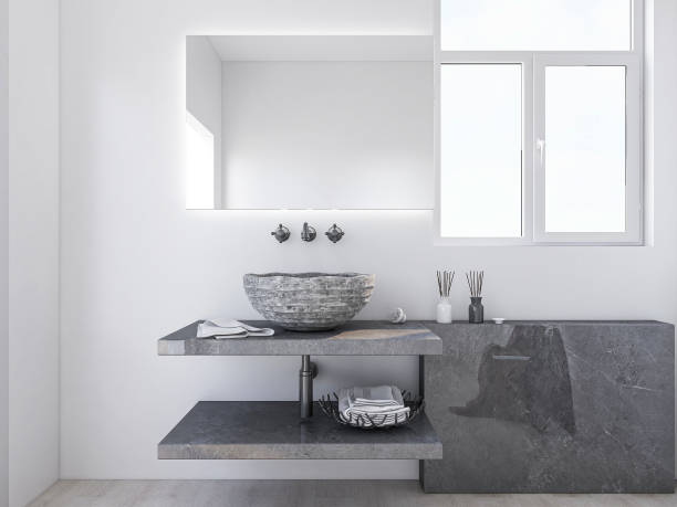 istock 3D rendering, modern residential clean bathroom design, with washbasins, mirrors, toilets, shower equipment and bathtubs, the sun shines in from the floor window. 1207786105