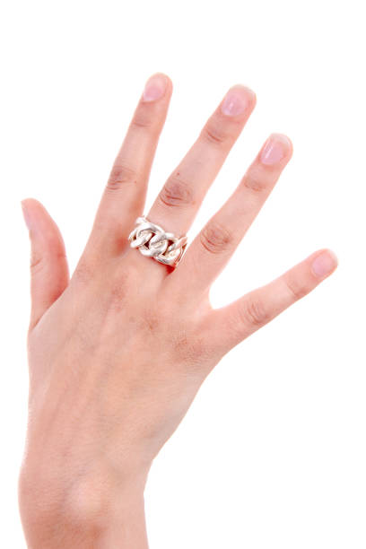 istock Womans hand is holding up five fingers over white background 1207786672