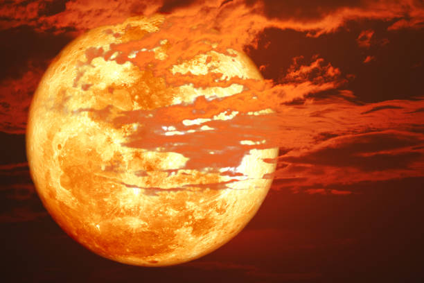 super blood snow moon back on silhouette cloud on sunset sky, Elements of this image furnished by NASA, https://spacewatch.global/2018/12/new-space-moon-race-nasa-taps-nine-u-s-companies-for-commercial-lunar-payload-services/
