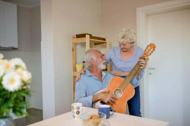 istock Mature Enjoying Music Together 1207788323