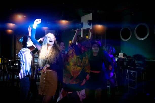 istock Audience dancing in concert 1207797717