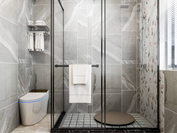 istock 3D rendering,Clean modern residential bathroom and toilet design, which is equipped with washstand, toilet and shower equipment, etc. 1207798251