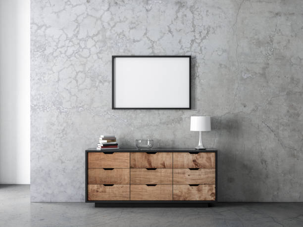 istock Horizontal black poster Frame Mockup hanging on the wall in modern living room above commode 1207798566