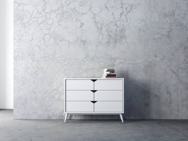 istock Modern white commode mockup in empty living room with concrete wall 1207799031