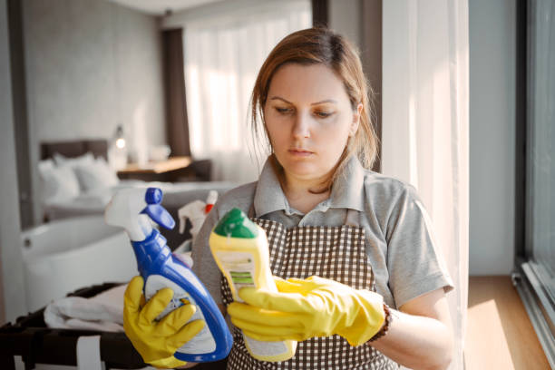 istock Maid working at Housekeeping in a hotel cent decide between cleaning chemistry 1207800505