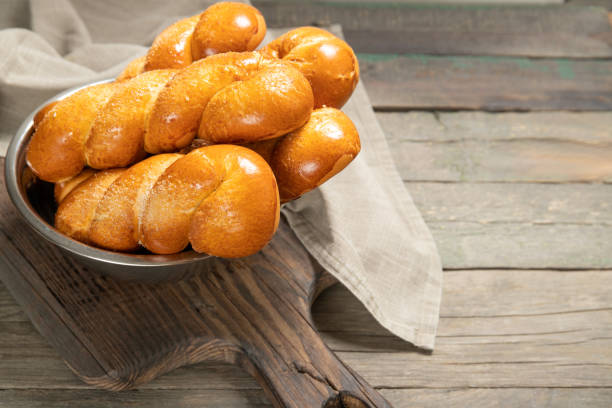 istock Delicious pastries.Tasty buns.Delicious Pigtail Buns 1207801365