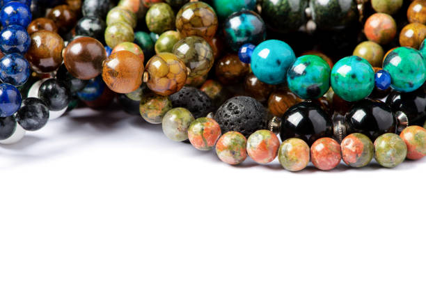 different natural stone beads on a white background - gem fashion jewelry bead imagens e fotografias de stock