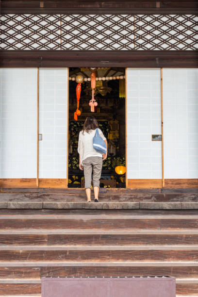 istock Woman at Japanese temple 1207812464