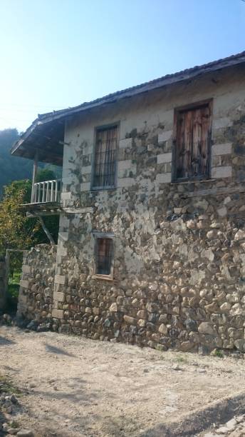 istock Stone village house 1207813105