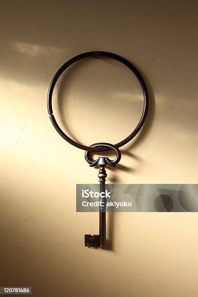 Old Key Hanging On A Wall Stock Photo - Download Image Now - Key, Key Ring, Old