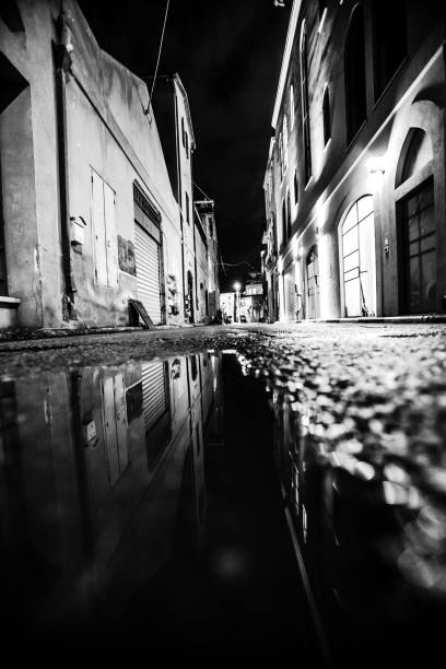 istock Dark alley reflection -Tel Aviv, Israel 1207821096