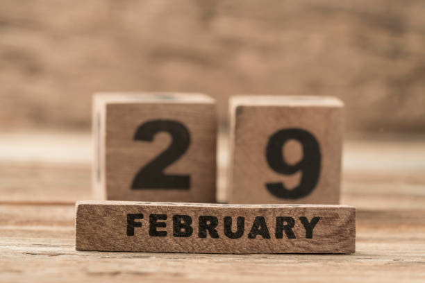 istock cube calendar for february on wooden background with copy space 1207821337