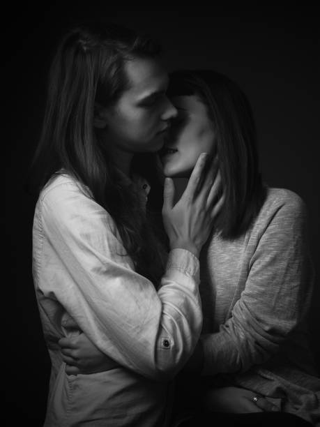 istock Couple posing in a studio. Black and white. 1207821343