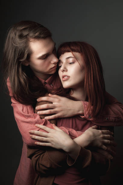 istock Young couple in love in studio 1207822572