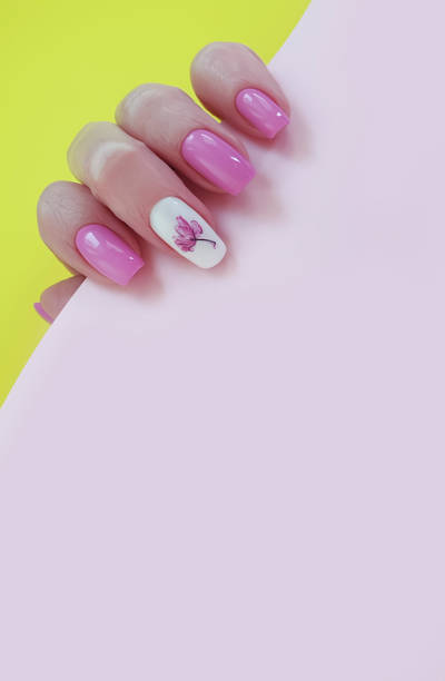 istock female hand nail beautiful manicure on a colored background 1207825511