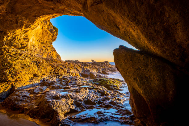 View from Cave to Tidal Rocks and Ocean at Thousand Steps Beach in Laguna Beach, Orange County, Southern California.