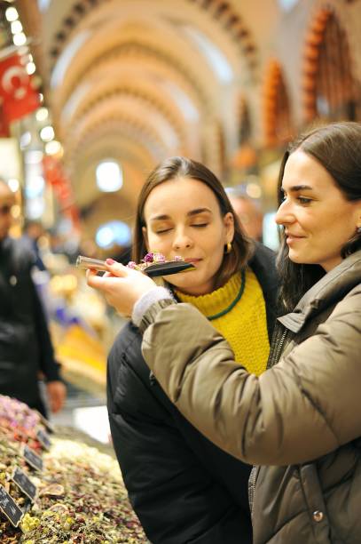 istock Young tourists exploring the spice bazaar of Istanbul 1207829634