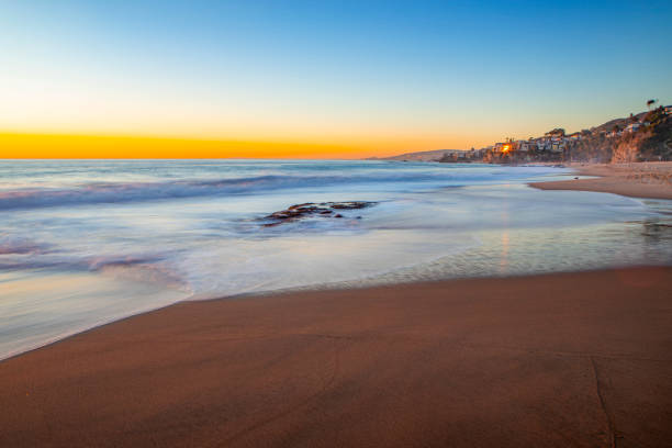 istock Long Exposure Water on Beach at Sunset 1207829701