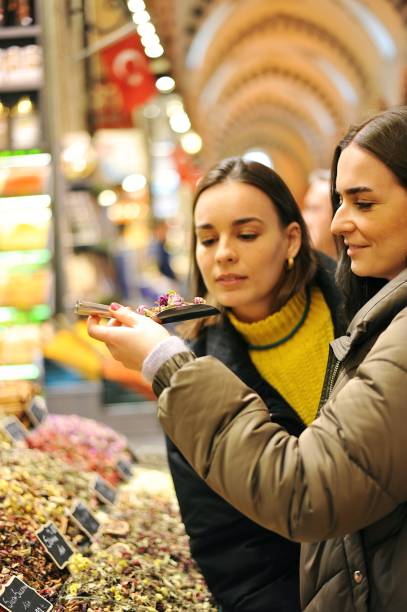 istock Young tourists exploring the spice bazaar of Istanbul 1207829848