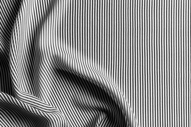 istock Black and white striped silk, background 1207830173