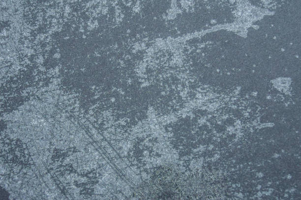istock Winter background, frost on the metal. Matte texture. 1207832229