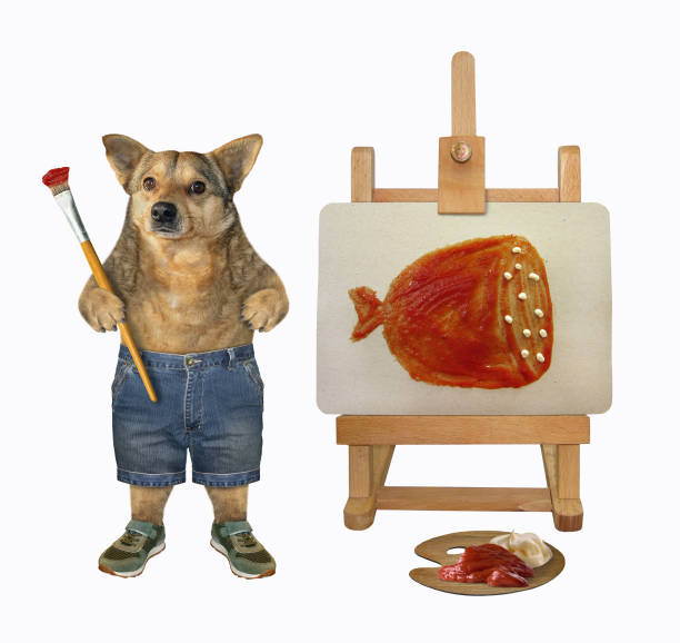 istock Dog artist painting on canvas 1207832248