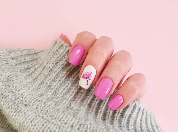 istock female hand nail beautiful manicure 1207833551
