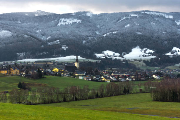 istock Small beautiful austrian village surrounded by mountains in Ennstal, Steiermark, Austria 1207835363