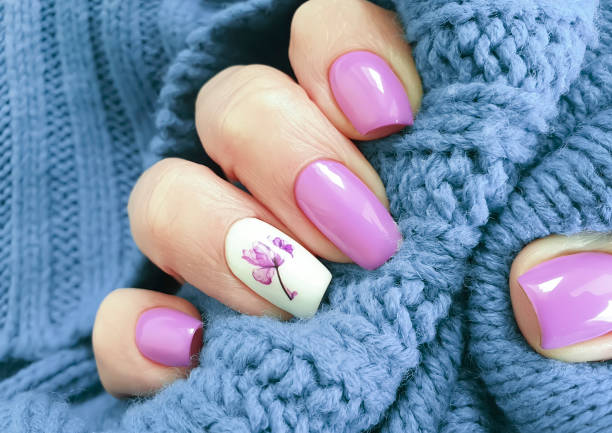 istock female hand nail beautiful manicure 1207835455