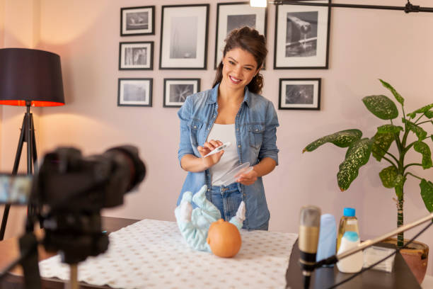 istock Nurse filming video about measuring babys temperature 1207837848