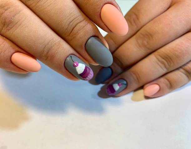 istock beautiful spring female cake manicure 1207837951