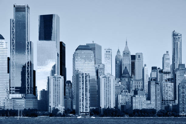 istock Manhattan Skyline, Black and white blue toned image 1207838945