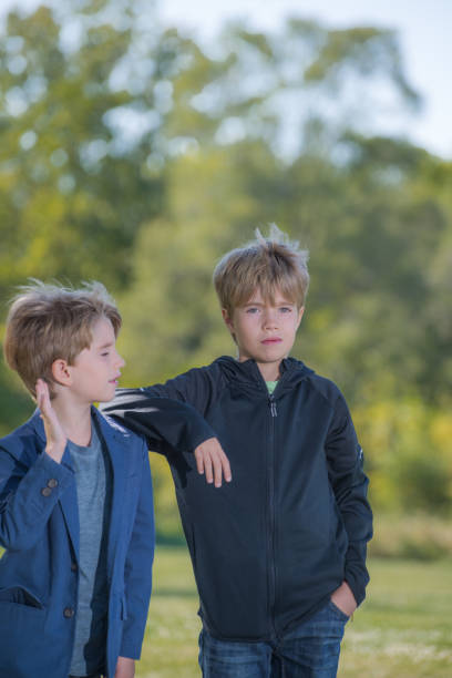 istock Portrait of two boys with a blurred background 1207842538