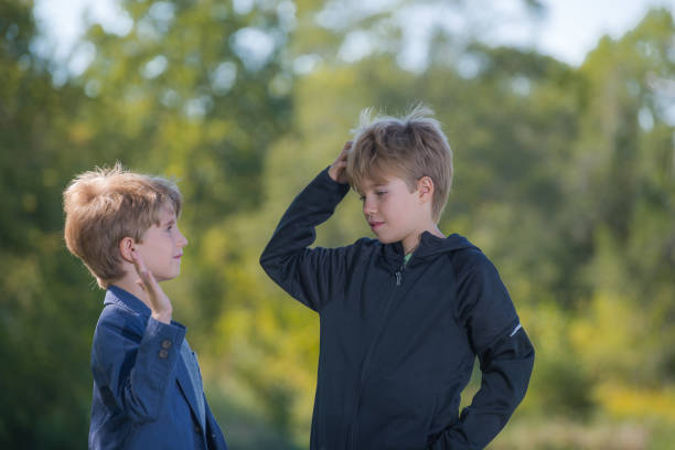 istock Portrait of two boys with a blurred background 1207842539