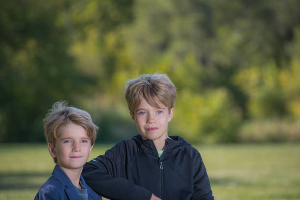 istock Portrait of two boys with a blurred background 1207842540