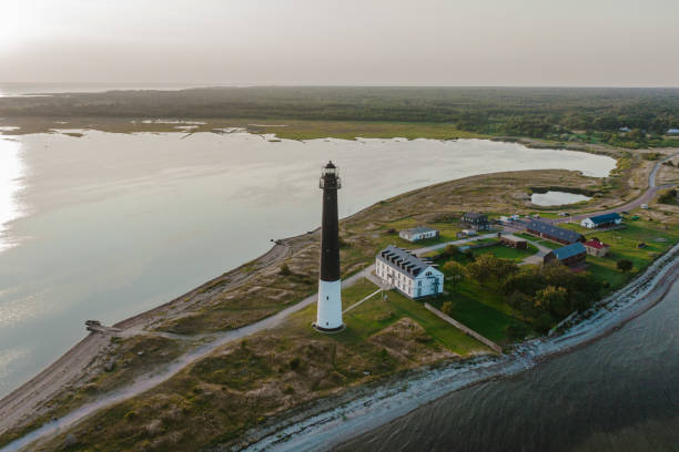 istock Scenic aerial view of lighthouse at sunset 1207844090