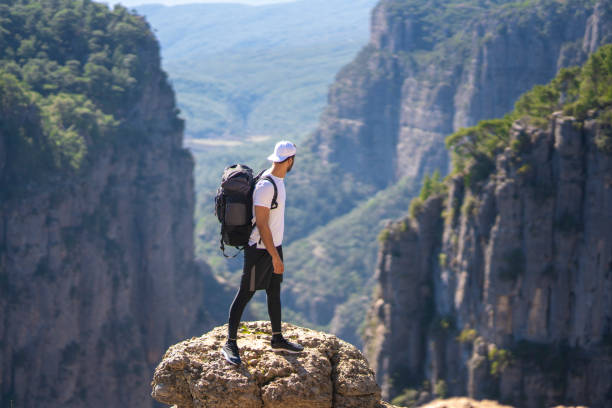 istock Hiker on mountains enjoy 1207847684