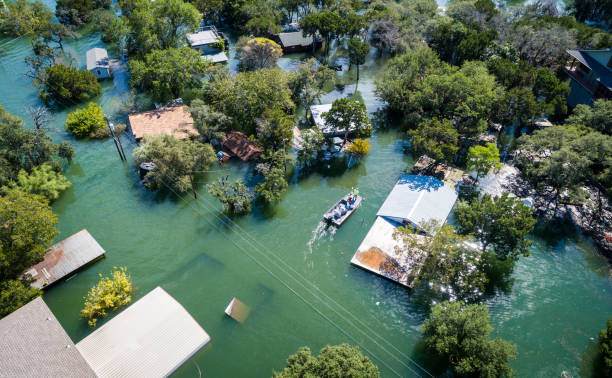 Water Rescue during National Disaster Flooding Aerial drone views high above Flooding caused by Climate Change - Water Rescue during National Disaster Flooding flood plain photos stock pictures, royalty-free photos & images