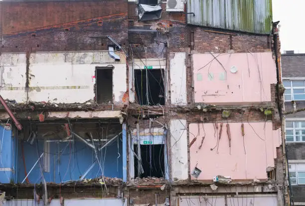 Demolition of hotel collapse following bomb blast explosion