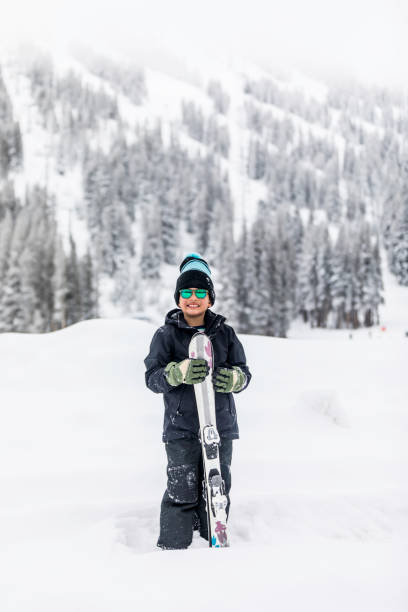 istock Kids playing and Having fun in the Snow 1207854155