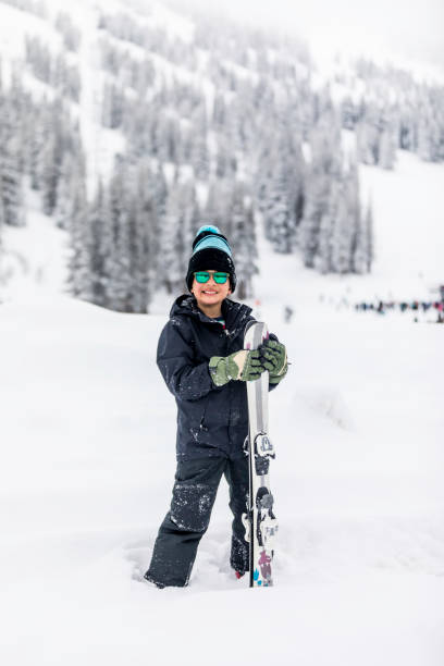istock Kids playing and Having fun in the Snow 1207854172