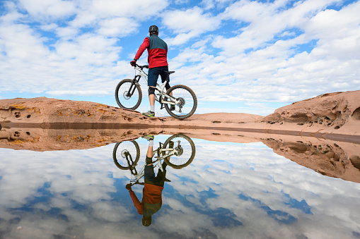Mountain Biker Reflection In Utah.