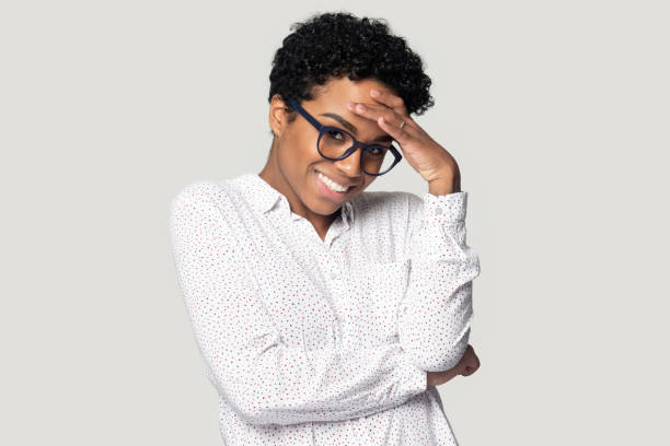 istock Attractive shy african american young girl blushing, feeling nervous. 1207856480