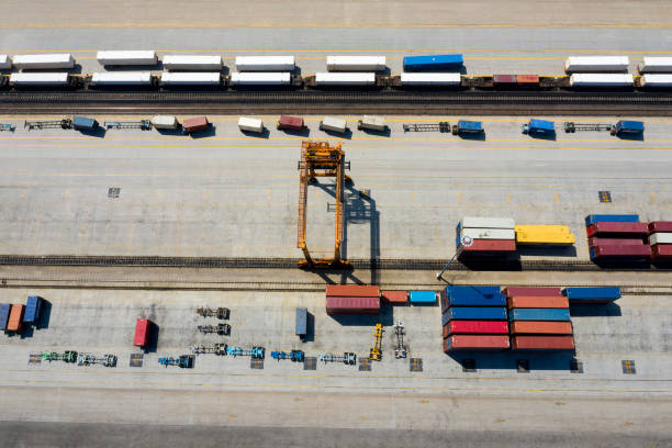 istock Aerial View of Cargo Containers and Gantry Crane 1207858094