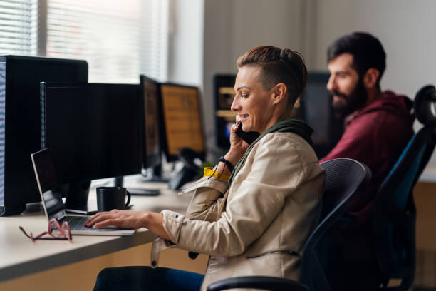 istock Business people working in the office and talking 1207859181