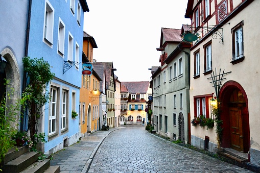 A quiet cobblestone street in the medieval walled town of Rothenburg ob set Tauber Germany